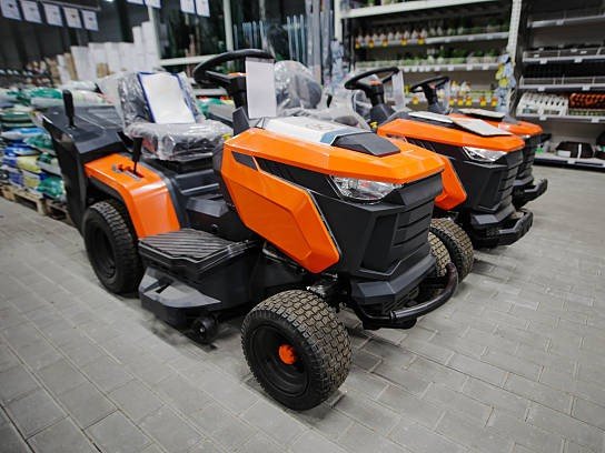New ride-on lawn mowers at garden center. Lawn tractors for sale